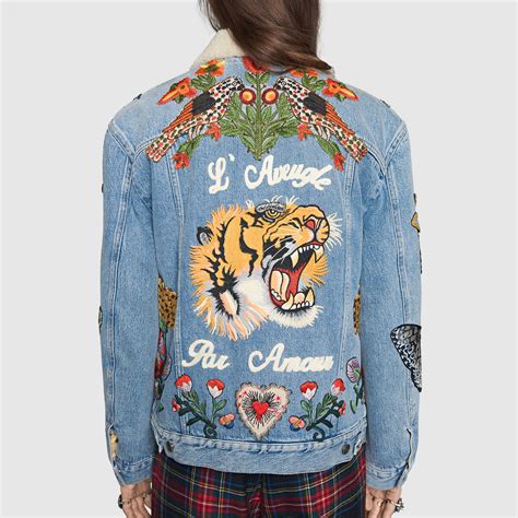 gucci denim jacket with embroidered tiger on the back|Gucci tiger rain jacket.